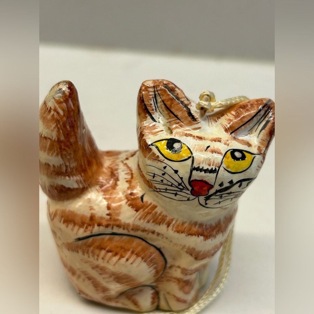 Vintage Folk Art hand-painted papier-mâché cat figurine.